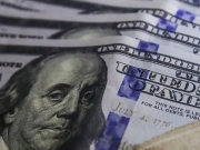 D&oacute;lar cai ap&oacute;s decis&atilde;o do Fed e Bolsa fecha em baixa